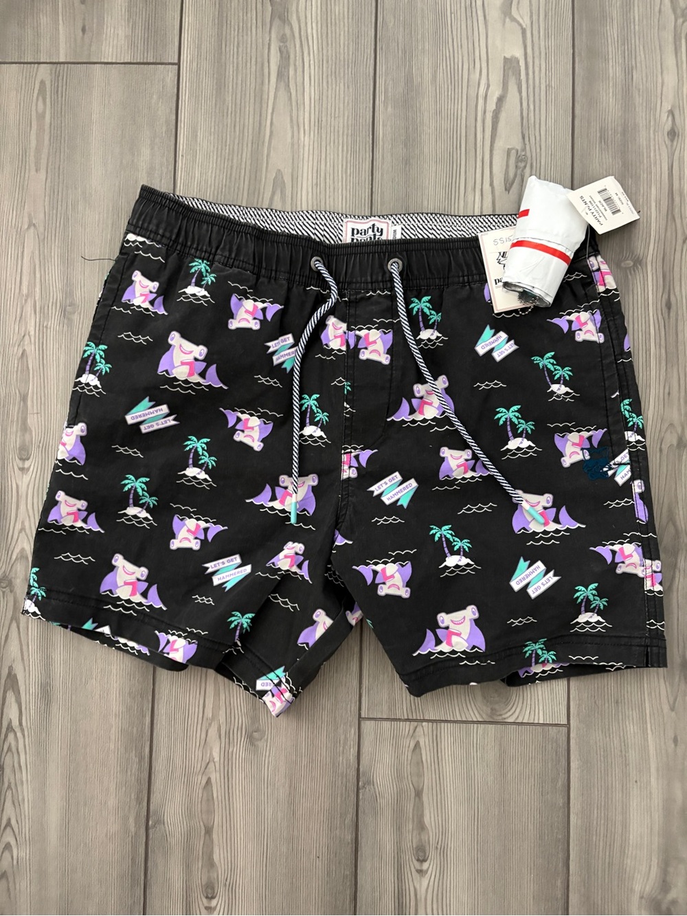 Party Pants Black Novelty Swim Trunks with Palm & Dolphin Print